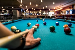 Why are pool tables a popular choice for home entertainment?